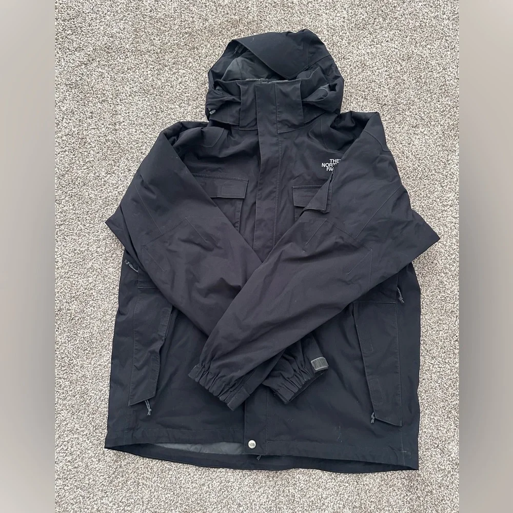 The North Face Black Hooded Raincoat with Multiple Front Pockets
